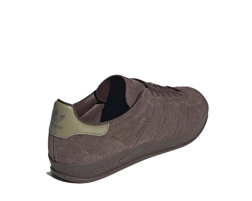 Indoor running shoes made of dark brown suede