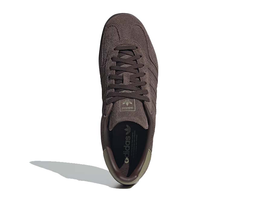 Indoor running shoes made of dark brown suede