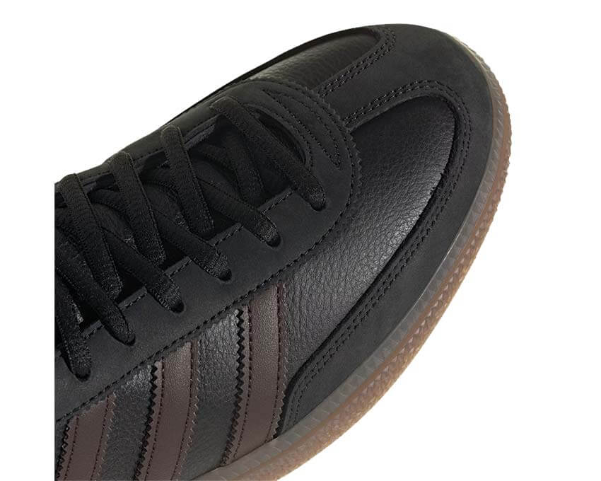Sports shoes for handball made of dark brown suede