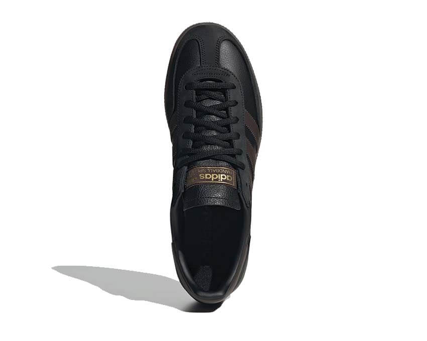 Sports shoes for handball made of dark brown suede