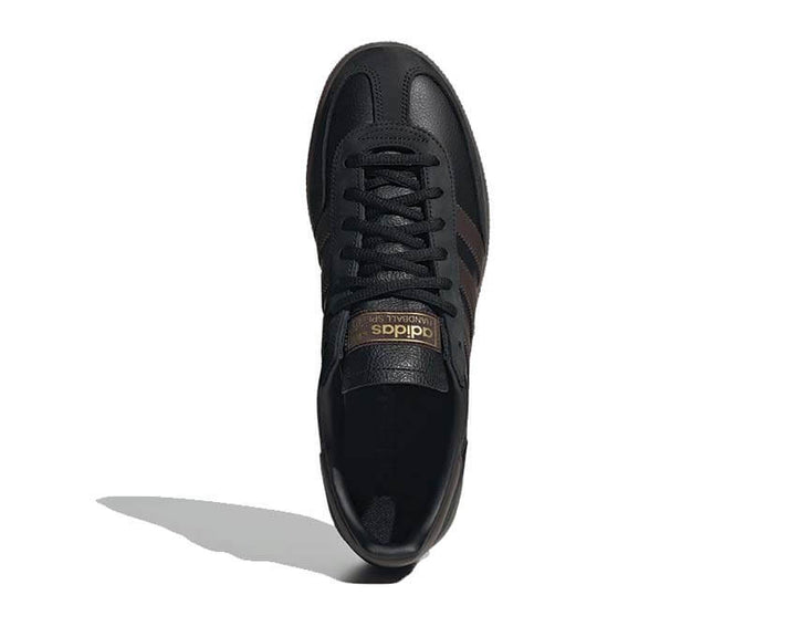 Sports shoes for handball made of dark brown suede