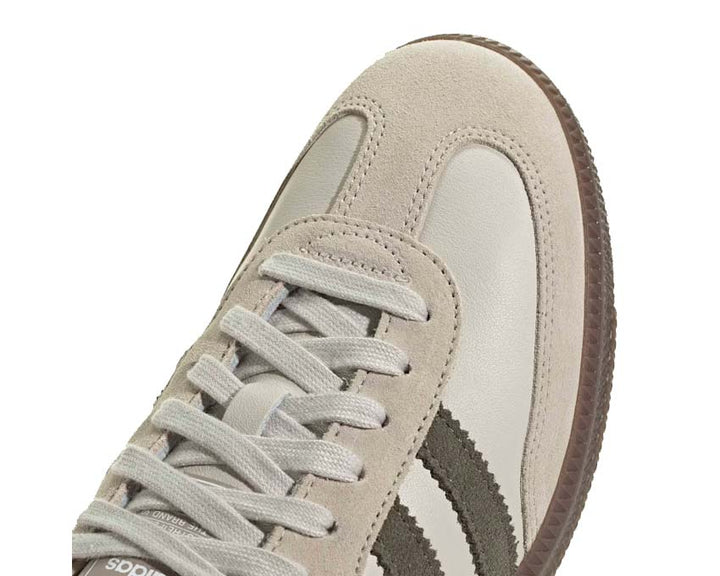 Classic sneakers made of leather and rubber in aluminium colour.