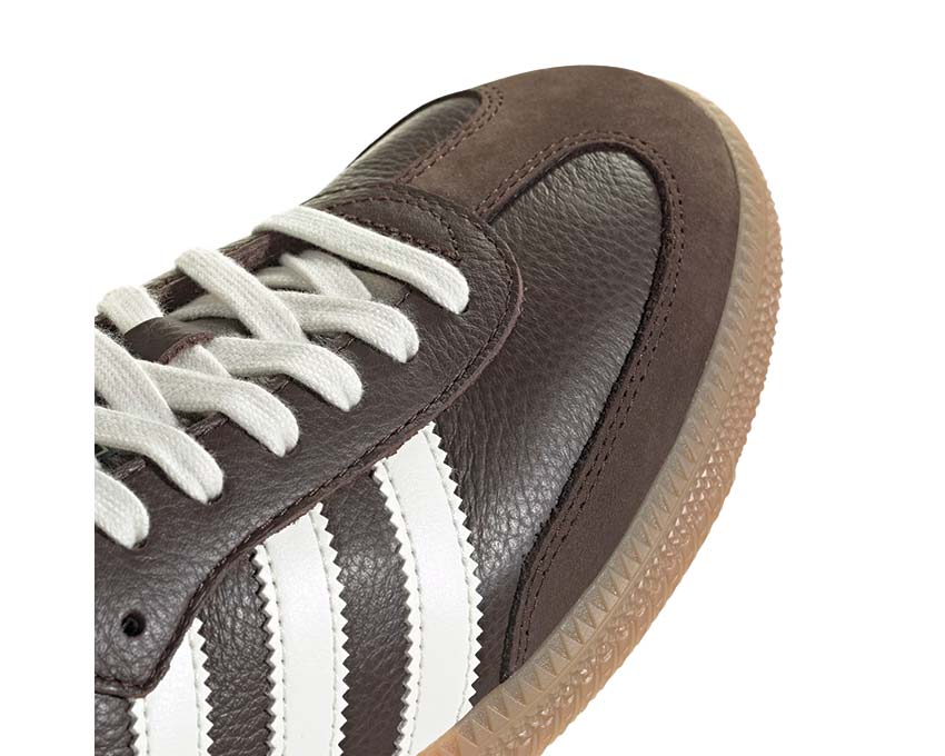Dark brown leather trainers with rubber sole