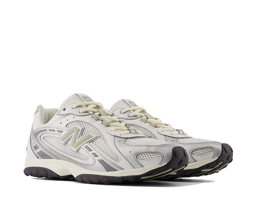 Leather and textile sneakers with a snake-inspired design.