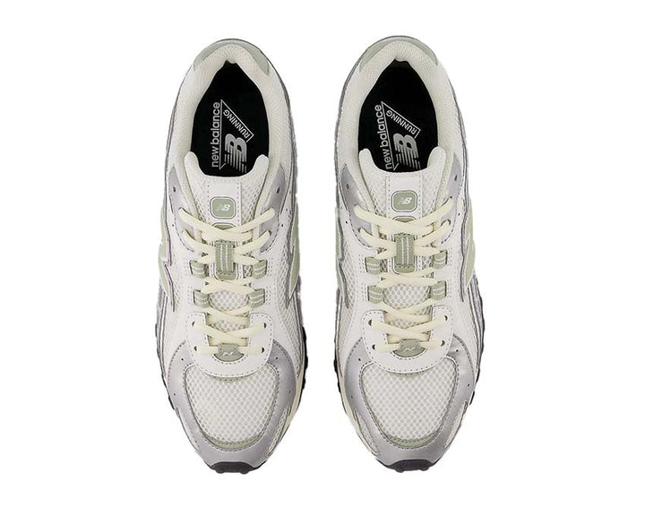 Leather and textile sneakers with a snake-inspired design.
