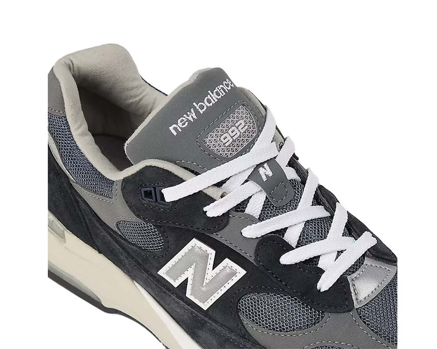 Sports shoes made of leather and fabric, navy blue, produced in the United States.
