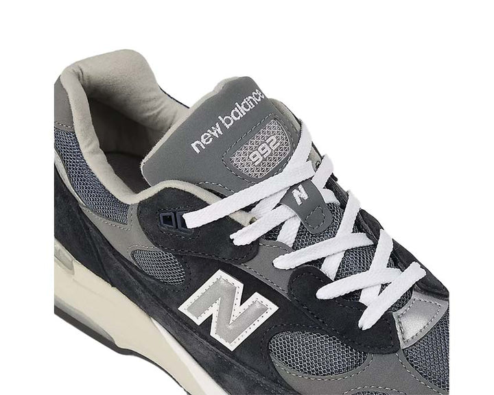 Sports shoes made of leather and fabric, navy blue, produced in the United States.