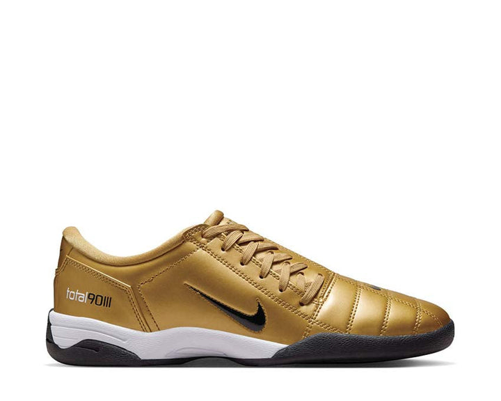 Football boots made of synthetic leather in metallic gold.