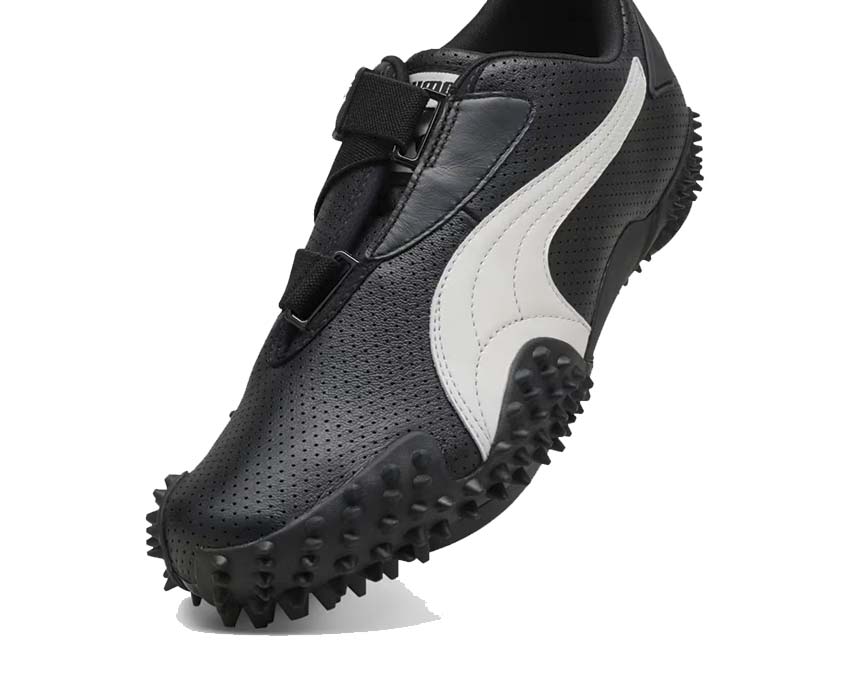 Black sports shoe with Velcro fastening and flexible sole