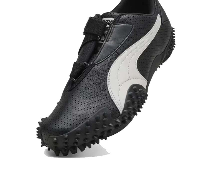 Black sports shoe with Velcro fastening and flexible sole