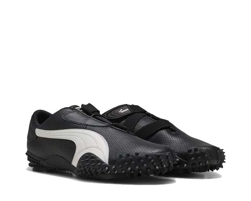 Black sports shoe with Velcro fastening and flexible sole