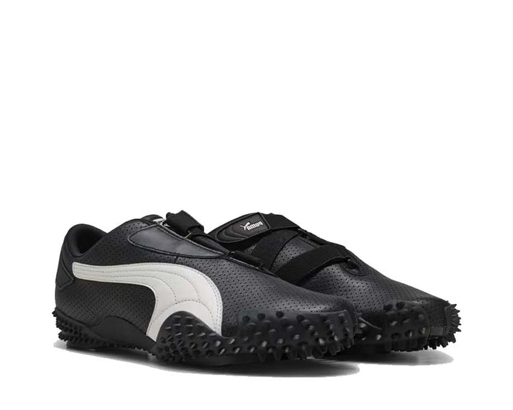 Black sports shoe with Velcro fastening and flexible sole