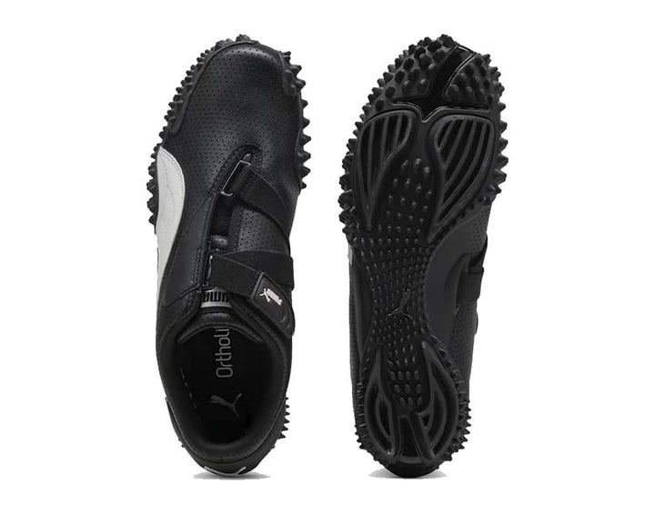 Black sports shoe with Velcro fastening and flexible sole