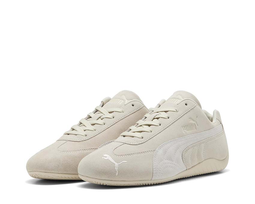 Low white leather sports shoes for driving and everyday wear