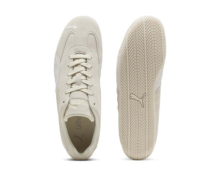 Low white leather sports shoes for driving and everyday wear