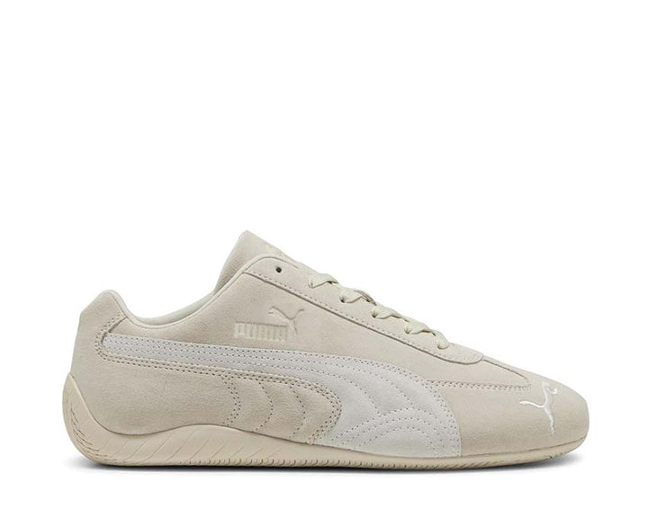 Low white leather sports shoes for driving and everyday wear